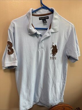 U.S. Polo Assn. Men’s Light Blue Polo with Brown Logo & Sleeve Patch